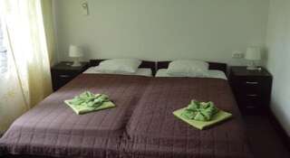 Гостиница Кокос Небуг Бюджетный двухместный номер с 2 отдельными кроватями-1